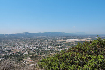 Panorama view on a clear summer day full of sun. Panorama of the island of Rhodes.	
