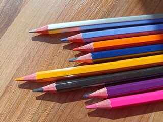 pencils on a wooden table