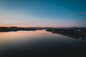 The beautiful sunrise reflecting on lake burley griffin, Canberra, in the morning