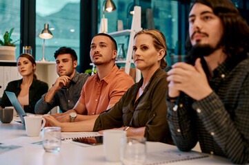 Business people, meeting and listening to presentation at desk for onboarding, training and...