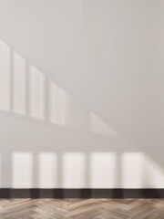 Blurred shadow fall onto white wall and herringbone wooden floor