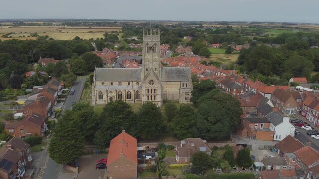 Drone. UK village. Church. Middle class housing estate. Hull.UK. 6.7.2024