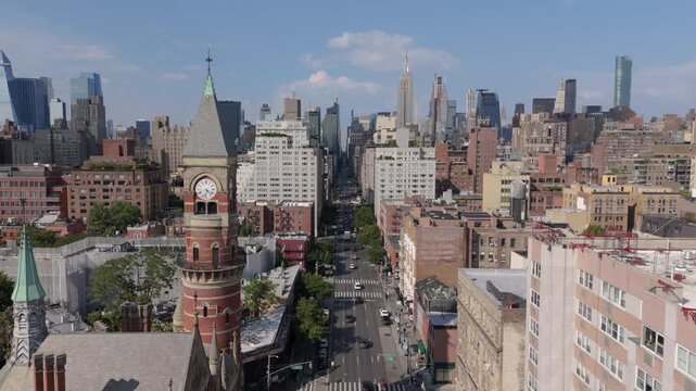 flying north over 6th Ave. past Jefferson Market Library in NYC