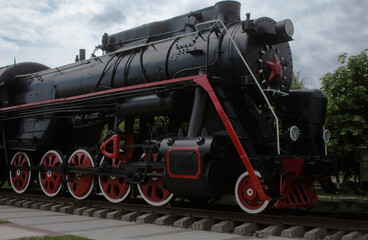 Fototapeta premium Train close-up on railway tracks