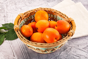 Raw ripe sweet apricots heap