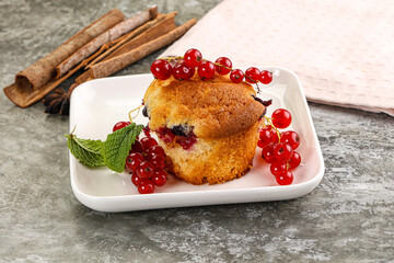 Delicous cupcake with red currant