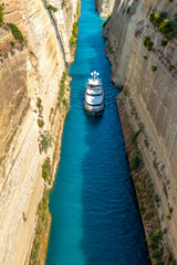Greece Peloponnese Corinth Canal and a boat passing through the canal