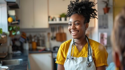 A healthcare worker engages warmly with others in a cozy kitchen, radiating positivity and professionalism