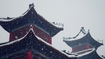 A serene winter scene featuring traditional architecture with snow-covered roofs, creating a peaceful and picturesque atmosphere.