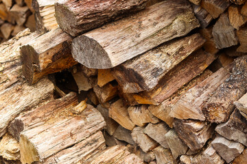 chopped wood ready for the heating season in winter. wood stocks.stoke the stove.Close up. Firewood for the winter.