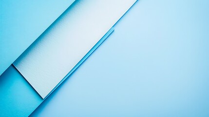 A minimalist artistic representation featuring a simple composition of blue paper strips arranged in order, emphasizing clean lines and the elegance of simplicity in design.