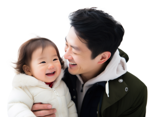 Asian father holding his baby girl in his arms and smiling together