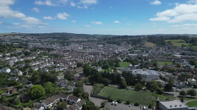 Newton Abbot, South Devon, England: DRONE VIEWS: Looking south across a school, residential housing and towards the town centre. Newton Abbot is a 13th century market town.