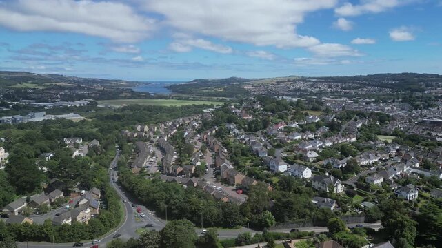 Newton Abbot, South Devon, England: DRONE VIEWS: Northern section of Newton Abbot, houses, factories, Newton Abbot racecourse and the River Teign. Newton Abbot is a 13th century market town (6).
