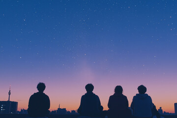 Fototapeta premium Friends Stargazing on a Rooftop Terrace at Dusk 2