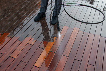 High pressure washing and cleaning wood deck