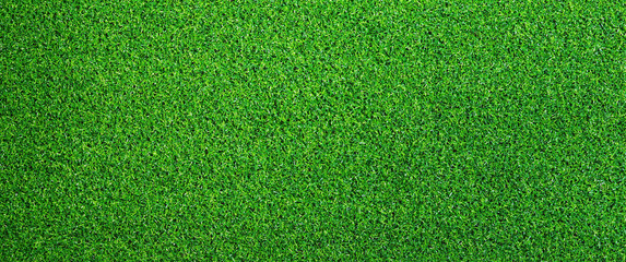 Artificial grass, covering. Artificial green grass mat, top view. Texture. Background. Artificial...