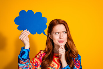 Photo of young woman hold paper speech cloud skeptical empty space dressed stylish colorful clothes...