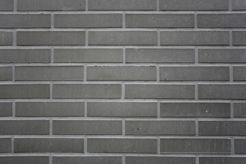 Naklejka premium Mur de briques de parement rectangulaires grises