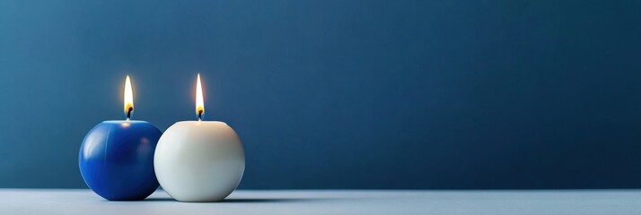 Independence day of Finland celebration. Burning candles in the colors of the Finland flag. Horizontal banner. Free space for text. Holiday poster, card. Blue and white candles on a blue background