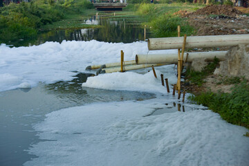 River water is polluted with foam