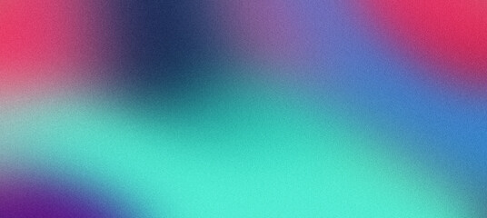 Blurred gradient of pink, blue, and green colors with a subtle grainy texture in an abstract background