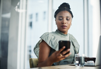 Black woman, laptop and phone for planning in office, online research and digital notes for tasks....
