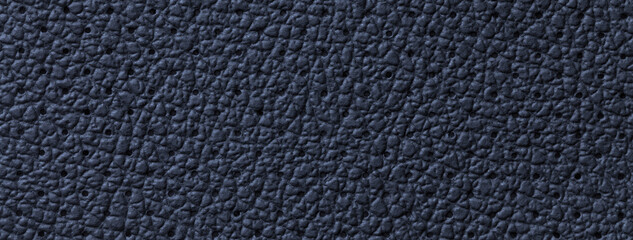Perforated navy blue leather texture background, closeup. Denim backdrop from wrinkle skin.