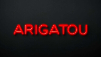 Obraz premium arigatou red neon lettering on plain dark black background