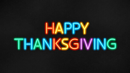 Obraz premium happy thanksgiving colorful neon lettering on plain dark black background