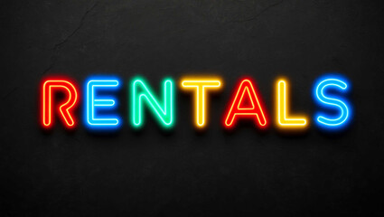 Obraz premium rentals colorful neon lettering on plain dark black background
