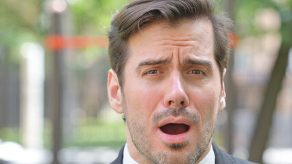 Fototapeta premium Close up of Shocked Face of Young Businessman