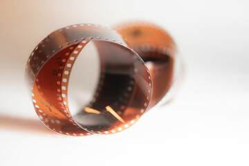 Curled Film Strip on White Background