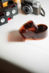 Vintage Film Rolls on White Surface