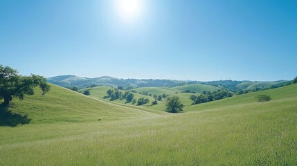 Fototapeta premium A peaceful rural landscape with rolling hills and a clear blue sky, perfect for a calming screen saver.