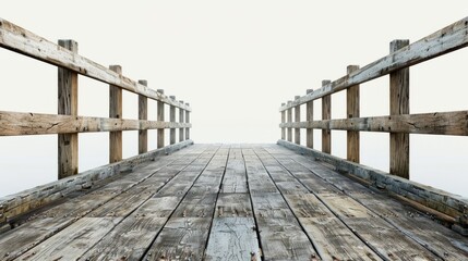 Obraz premium Wooden pier extending into foggy water at dawn