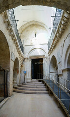 Fototapeta premium Entrace door to St. Michael Archangel sanctuary, Monte Sant'Angelo, Gargano, Puglia, Italy