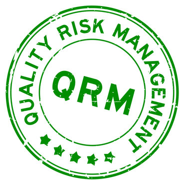 Grunge green QRM Quality Risk Management word round rubber seal stamp on white background