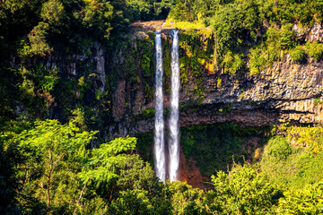 The famous double waterfall of Chamarel in the south of Mauritius. Tallest single drop cascade of...