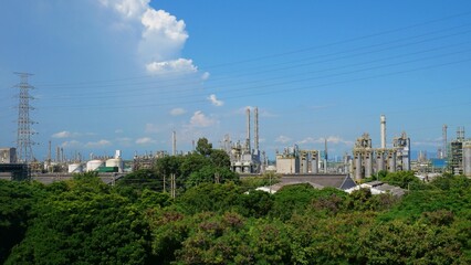 Large industrial plants coexist with nature.