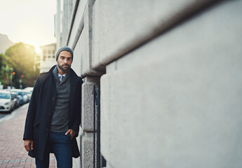 Confident, man and portrait by building in city for winter morning, travel and journey to work. University, educator and professor with pride for education, employee and commute to campus in London