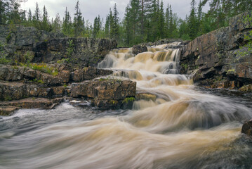The Lusbostupet waterfall in the Aman river