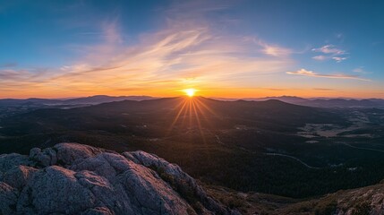 Obraz premium Serene Sunset over Mountain Range