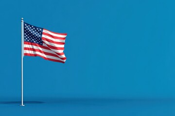 Fototapeta premium An American flag waving on a blue background