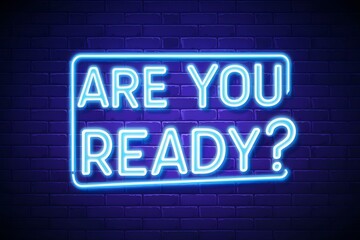 Obraz premium Neon ARE YOU READY? sign with blue neon outline against dark brick wall.