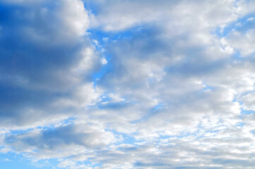 Blue sky landscape with dramatic colorful clouds and sunlight, colorful blue sky nature