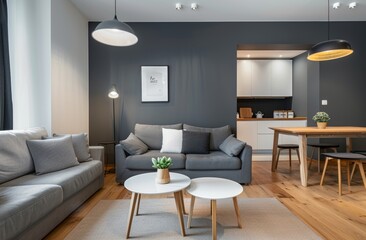 living room with an elegant and minimalist bookcase in light wood, white walls, beige sofa, round coffee table