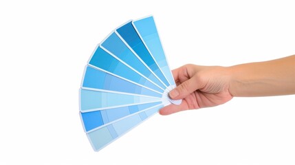 A hand holding color palette