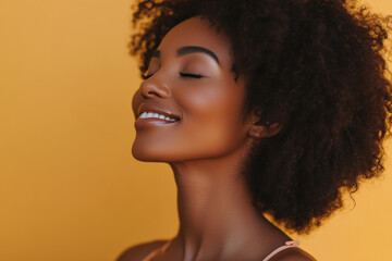 A close up of a black woman's face with her eyes closed