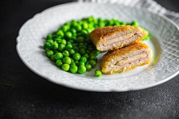meat cutlet cordon bleu chicken, cheese, bacon meal snack on the table copy space food background rustic top view